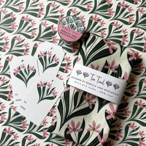 Hello Friend gift tags styled with matching botanical wrapping paper and tea towel by Rebecca Jane Woolbright