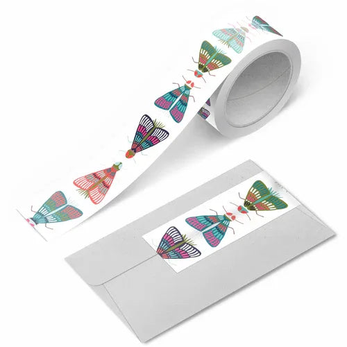 Moth Bow Tie Washi Tape roll with colorful moth illustrations on a white background by Rebecca Jane Woolbright.