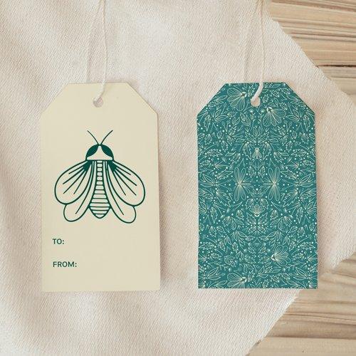 Front and back view of Orion Gift Tag showing cream moth design and deep teal patterned back