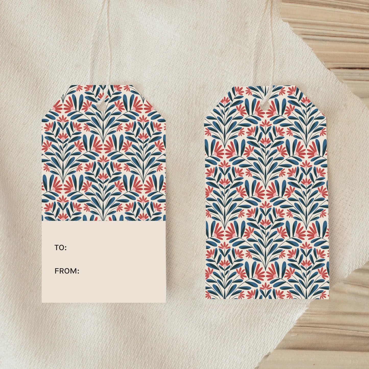 Front and back view of Snowflora Gift Tag showing festive botanical pattern and blank message side