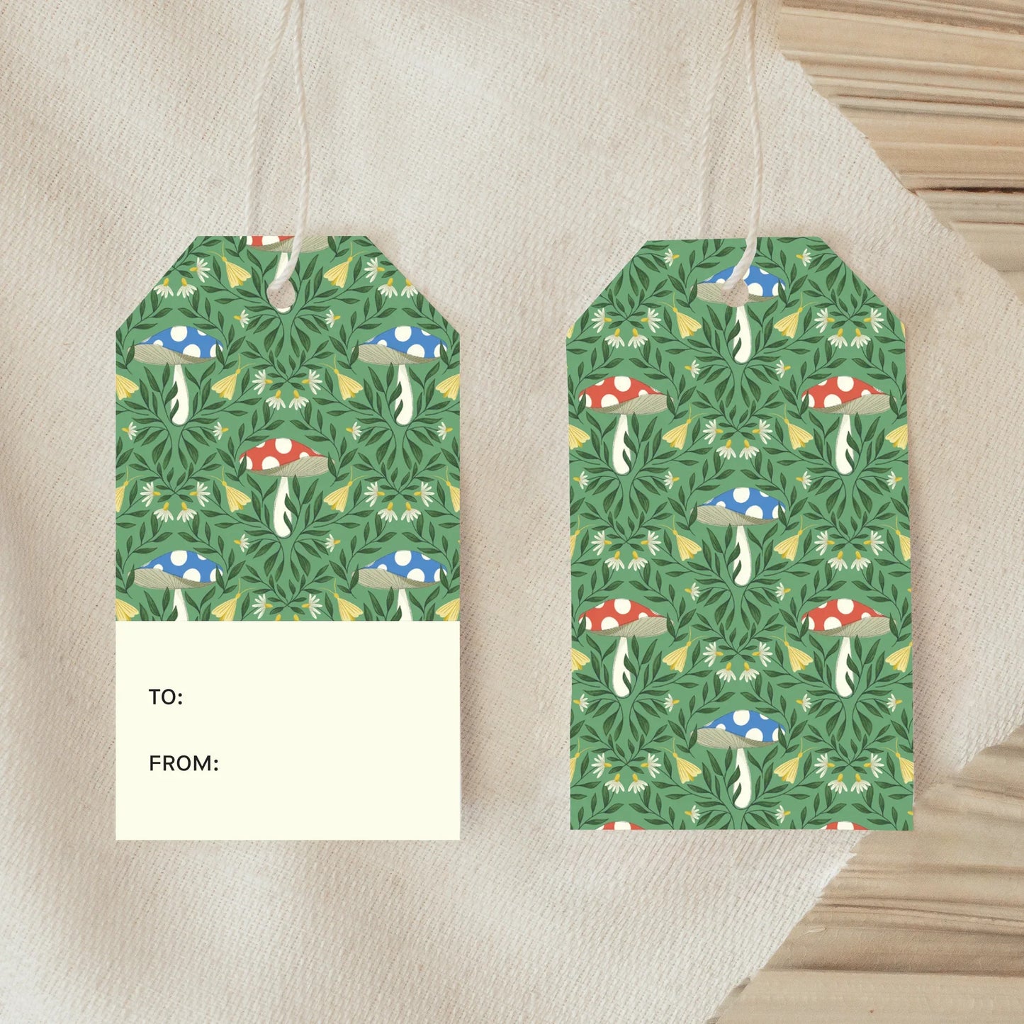 Front and back view of Undergrowth Gift Tag showing mushrooms, moths, and forest-inspired botanical pattern