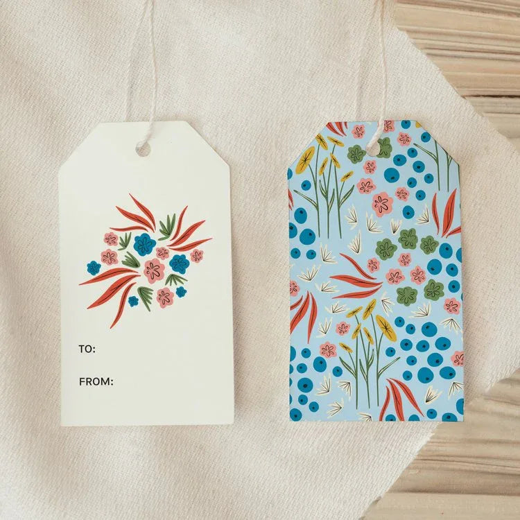 Front and back view of Pirouette Blue Gift Tags showing bright floral artwork and blue patterned back