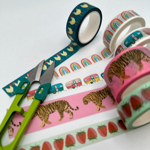 five vibrant rolls of washi tape all pulled out to see the full design with a lime green pair of scissors illustrated by Rebecca Woolbright. 