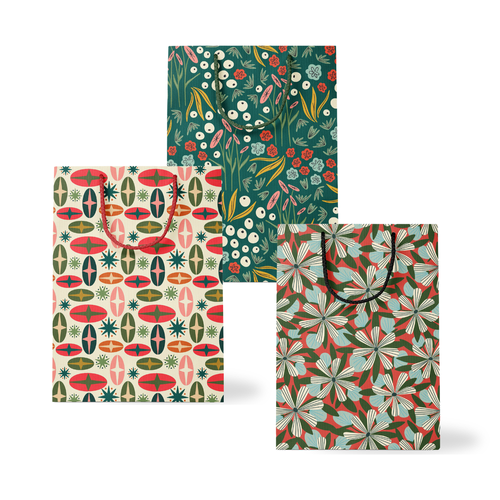 3 patterned gift bags on a white background