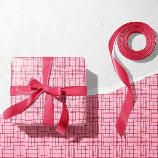 Pink wrapping paper with ribbon