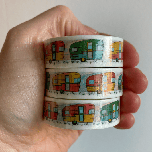 Stack of three rolls of Hit the Road washi tape designed by Rebecca Woolbright