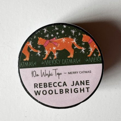 Merry Catmas washi tape roll showing coordinating label with “Merry Catmas” text and Christmas cat artwork.