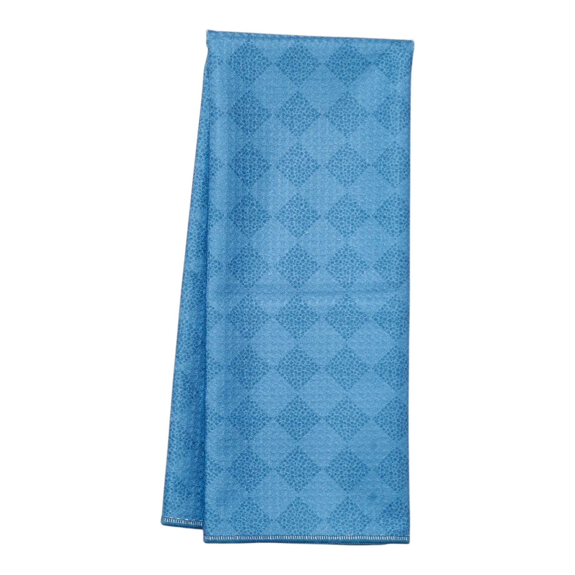 Blue patterned towel on a white background