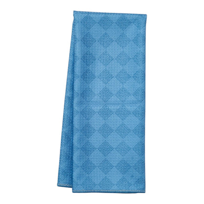 Blue patterned towel on a white background