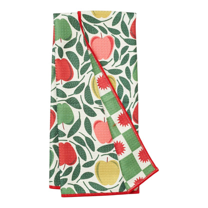 One reversible kitchen towel with fruit pattern on a white background