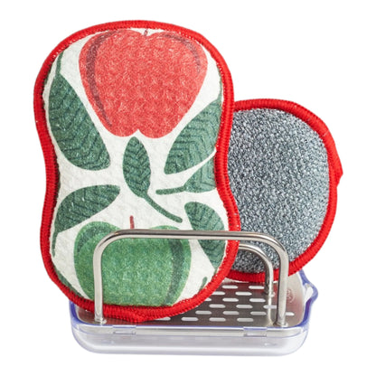 Front and back of a sponge with apple design on a white background sitting in a sponge holder