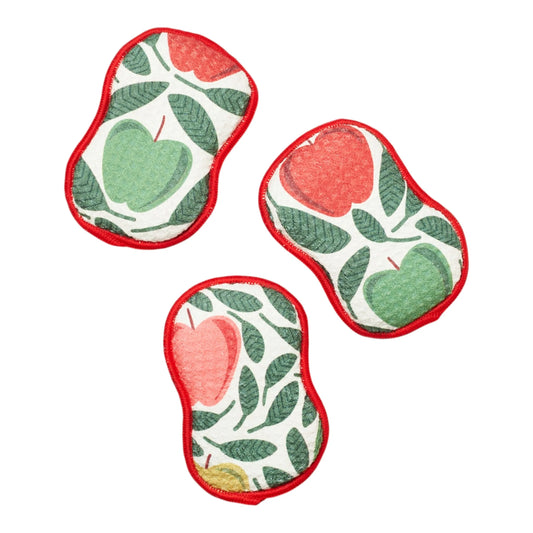 Three matching sponges with an apple and leaf pattern, arranged on a plain white background. Each sponge has a red border and features red and green apples on a white base with green leaves.